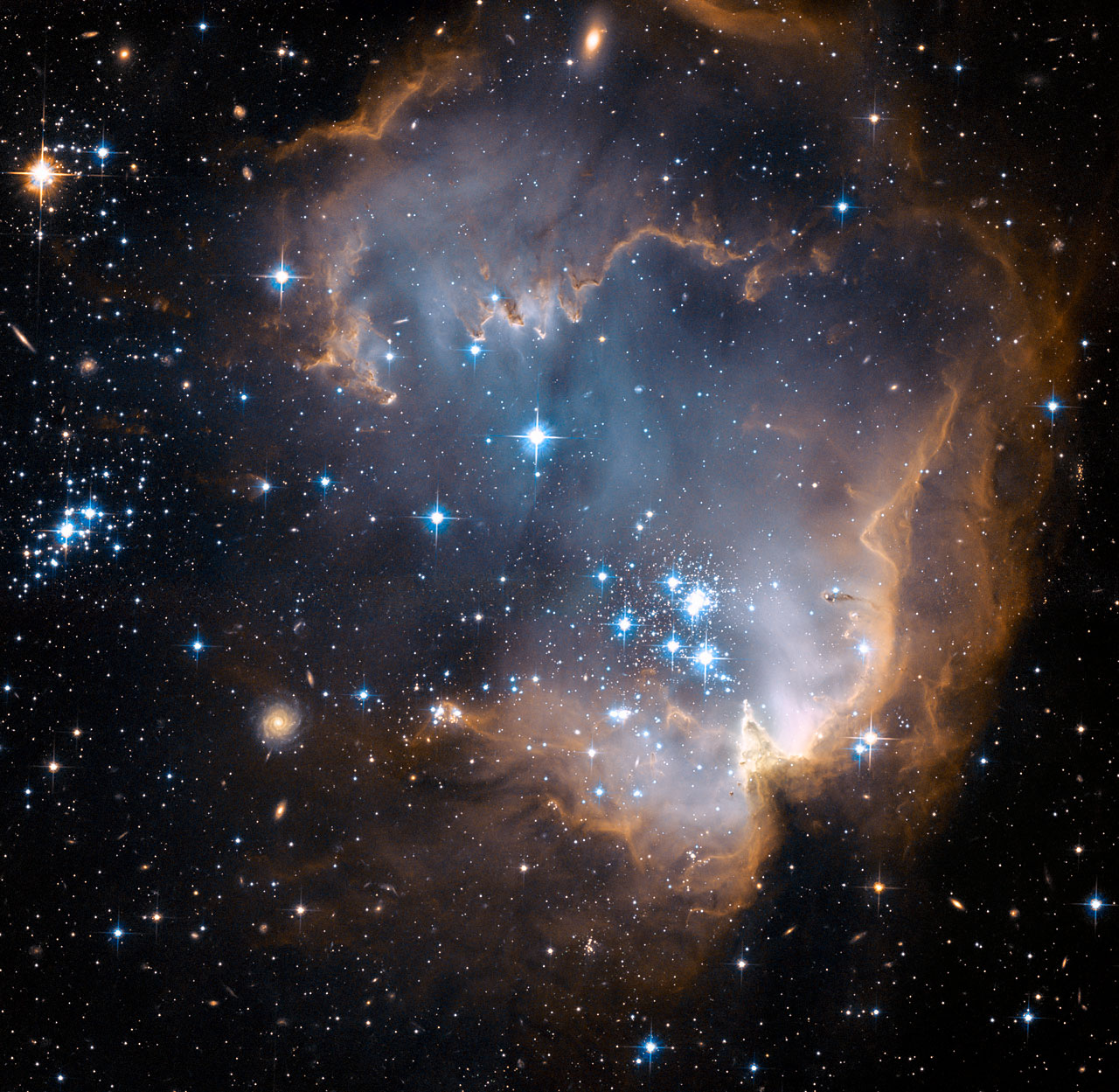 N90 nebula, “New stars shed light on the past” by ESA/Hubble